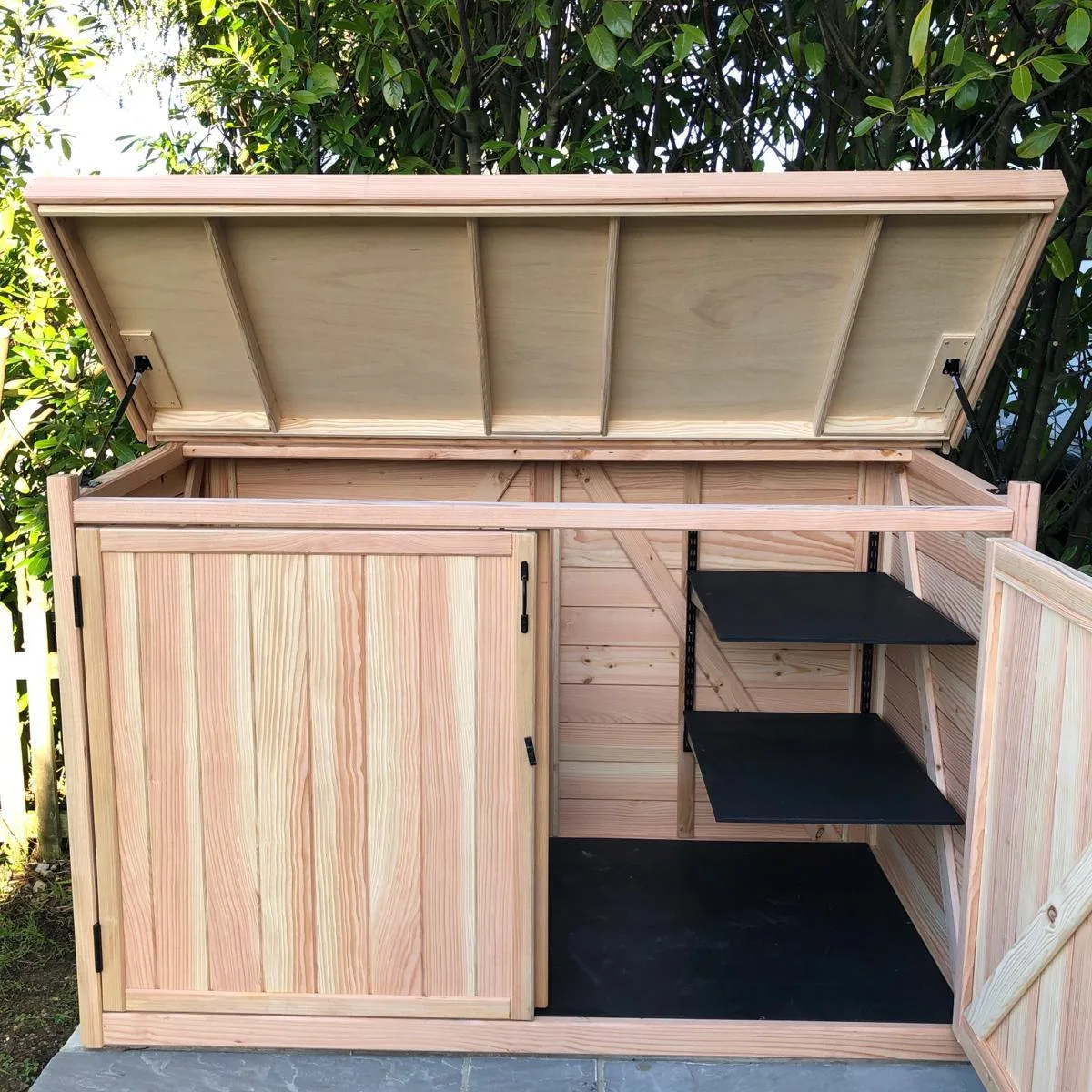 Wooden bin store with recycling shelves