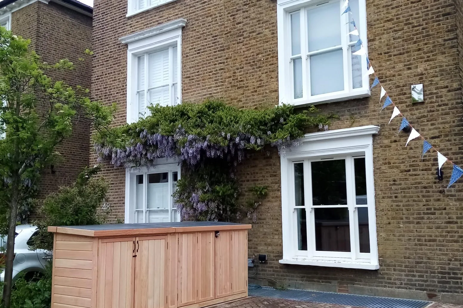 Pedalbase bike shed and triple wheelie bin store joined