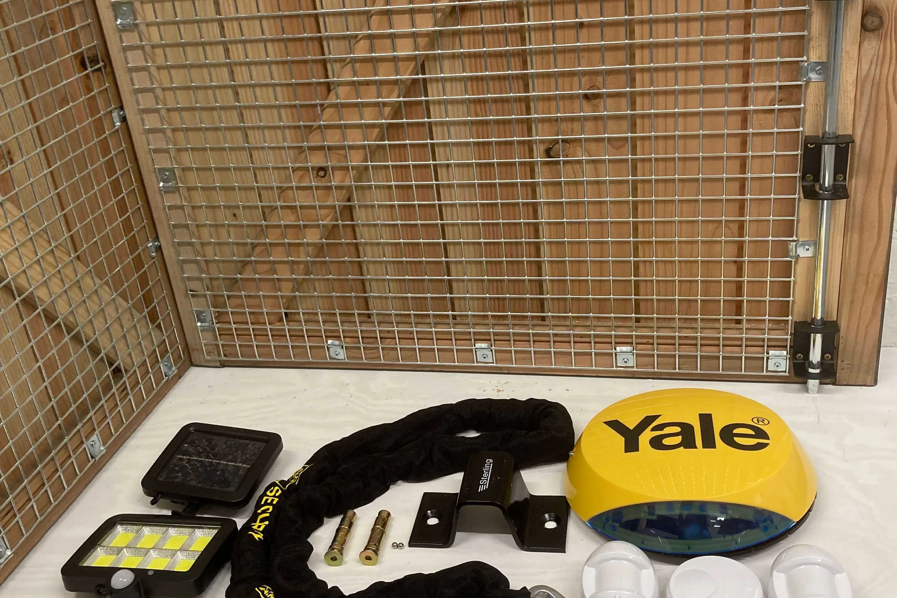 Bike shed ultimate security pack - containing motion sensor light, heavy duty chain and padlock, bike anchor points Yale alarm kit, extra roof bolts and internal steel mesh frame