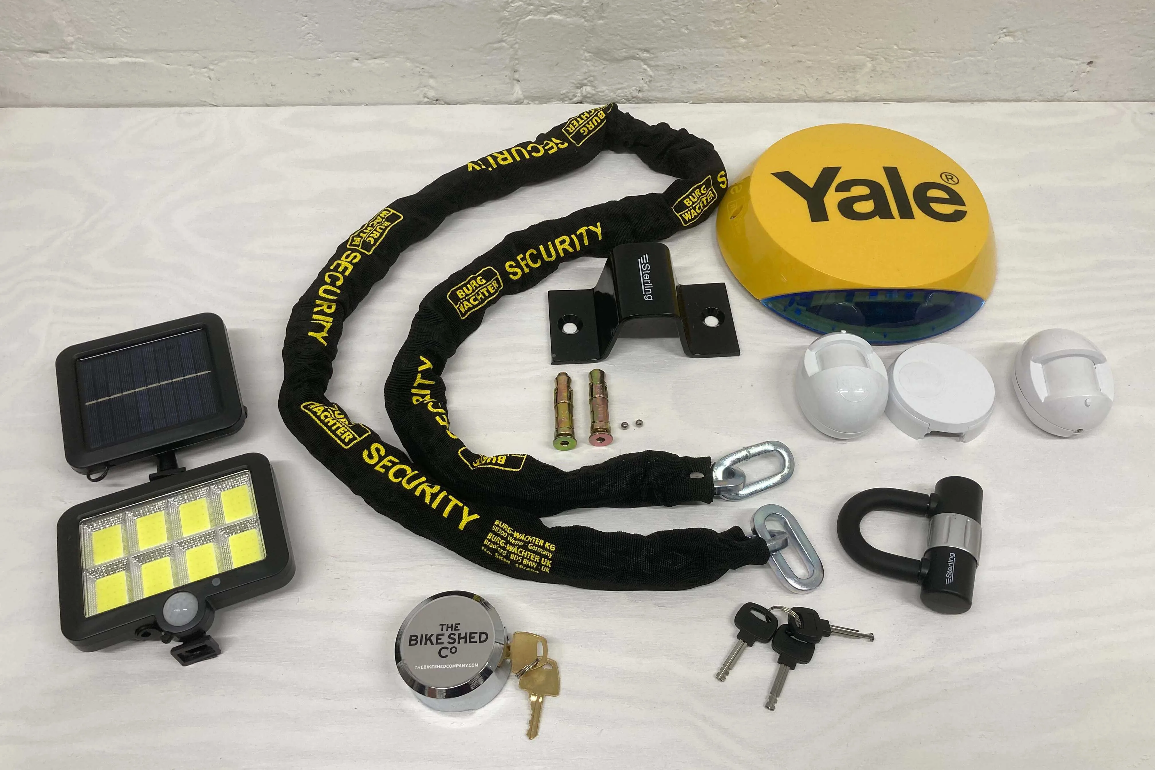 Bike shed premium security pack - containing motion sensor light, heavy duty chain and padlock, bike anchor points and Yale alarm kit
