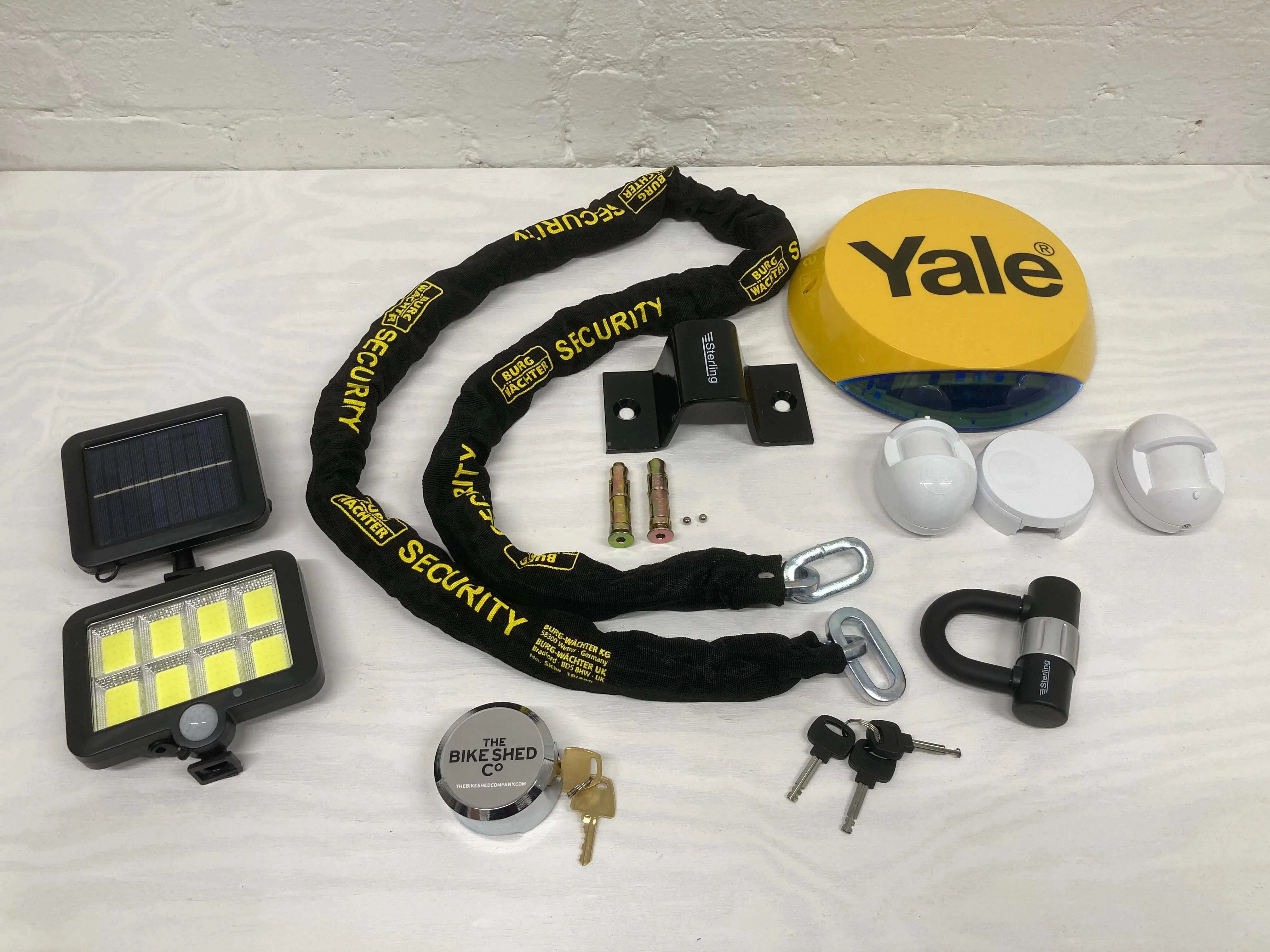 Bike shed premium security pack - containing motion sensor light, heavy duty chain and padlock, bike anchor points and Yale alarm kit